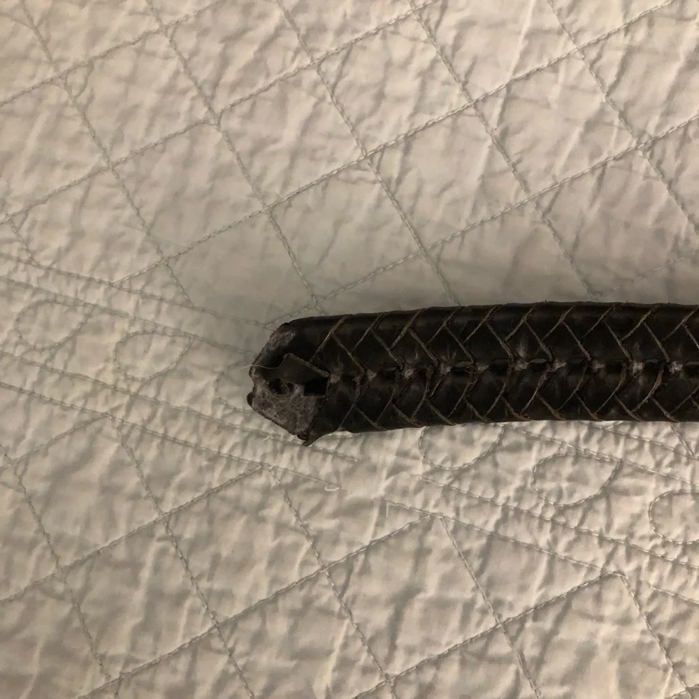 Coach black woven braided belt.